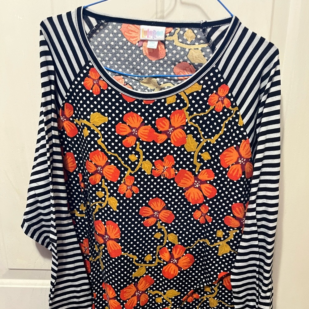 LuLaRoe Black Top with Orange & Gold Floral and Black-and-White Stripes
